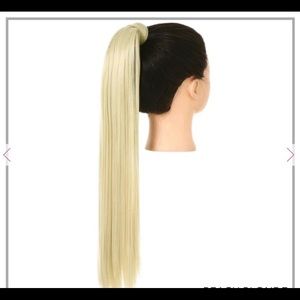 Blonde extension ponytail never worn